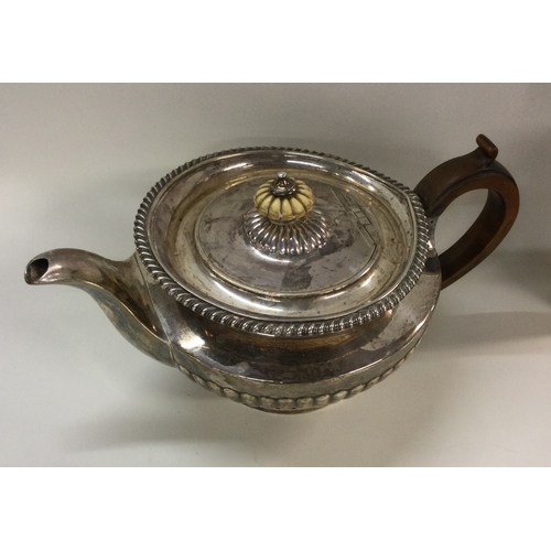 7 - A fine quality heavy silver George III fluted teapot. London 1821. By Thomas Burwash. Approx. 797 gr... 