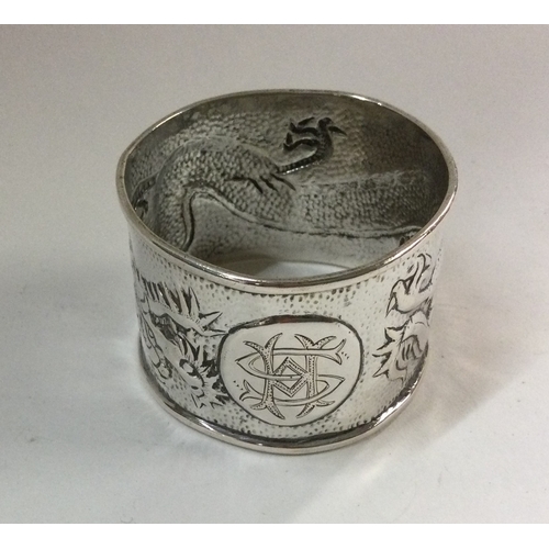 84 - A good Chinese silver napkin ring. Punched to interior. Approx. 29 grams. Est. £30 - £40.