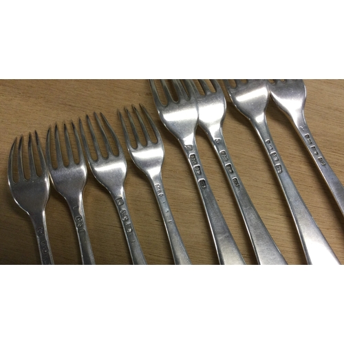 526 - A set of eight 18th Century bottom marked silver forks. Approx. 650 grams. Est. £450 - £550.