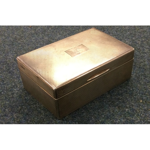 254 - An engine turned silver cigar box. London 1926. By Richard Comyns. Approx. 432 grams. Est. £250 - £3... 