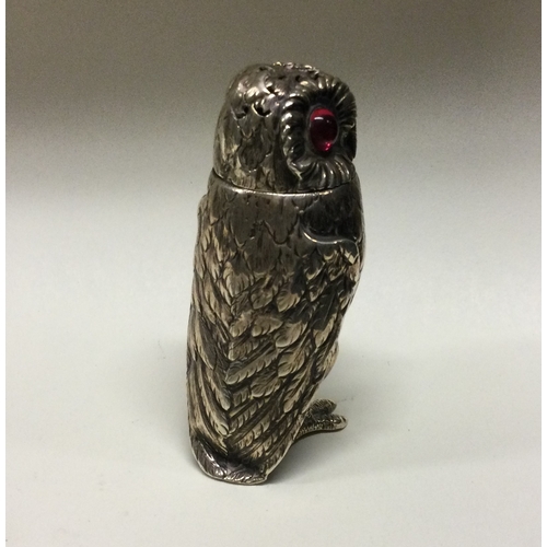 11 - A Victorian silver novelty silver pepper in the form of an owl. London 1850. By George John Richards... 