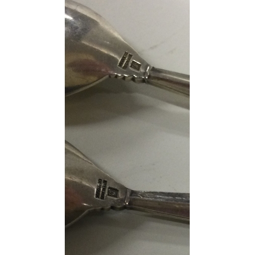 159 - GEORG JENSEN: A pair of stylish silver Danish silver servers. Approx. 72 grams. Est. £80 - £120.