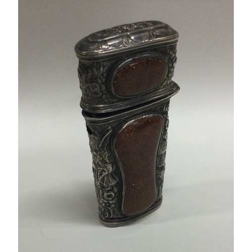187 - A Continental silver etui set with goldstone. Approx. 48 grams. Est. £40 - £60.