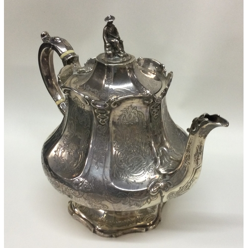 229 - A good Chinoiserie engraved silver teapot. London 1845. By George John Richards. Approx. 680 grams. ... 
