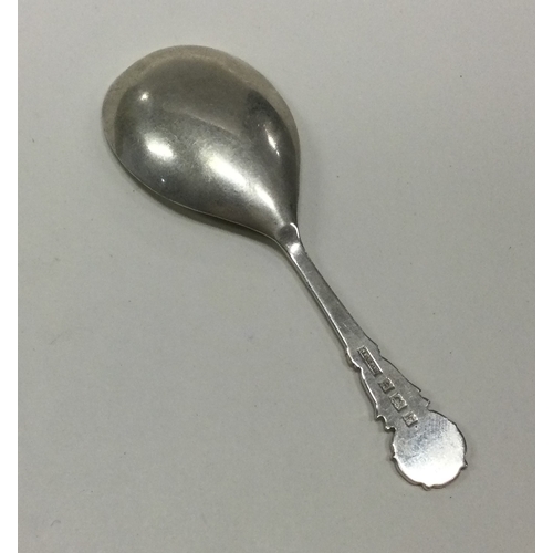 76 - A silver caddy spoon with chased floral decoration. Birmingham 1971. By JB Chatterley & Sons Ltd. Ap... 