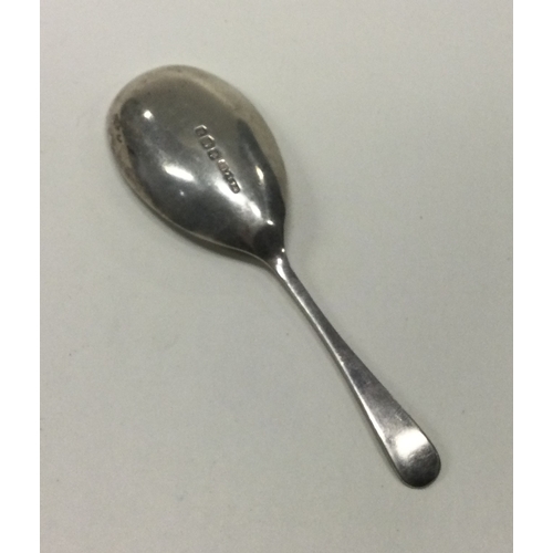 77 - A silver caddy spoon. Sheffield 1918. By WS Savage & Co. Approx. 14 grams. Est. £20 - £30.