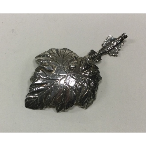 81 - A silver caddy spoon with leaf decoration. Birmingham 1831. By Joseph Wilmore. Approx. 20 grams. Est... 