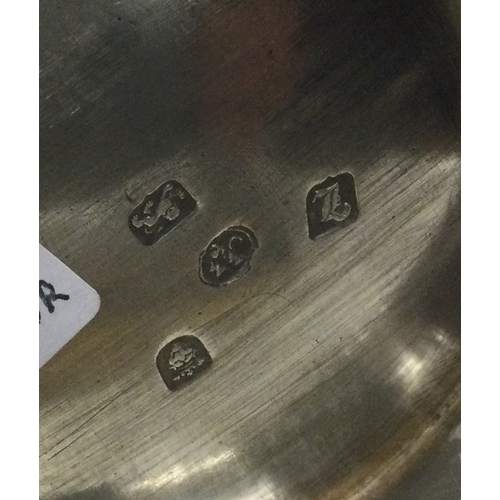 119 - A good quality Georgian silver baluster shaped jug with hinged top decorated with figures. London 17... 