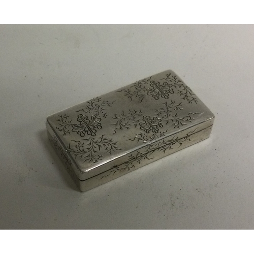 10 - A Japanese silver box with engraved decoration. Signed to base. Approx. 24 grams. Est. £60 - £80.