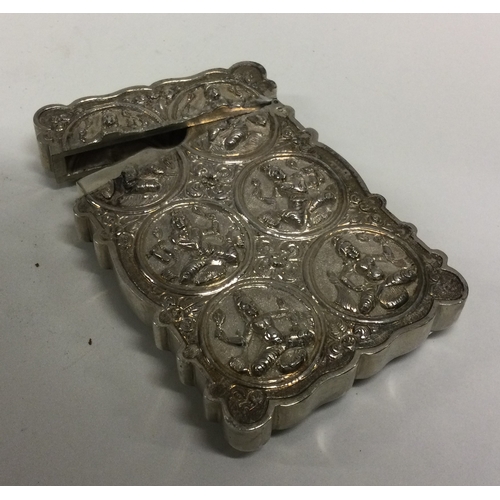 11 - A good quality chased Indian silver card case. Circa 1900. Approx. 126 grams. Est. £200 - £300.