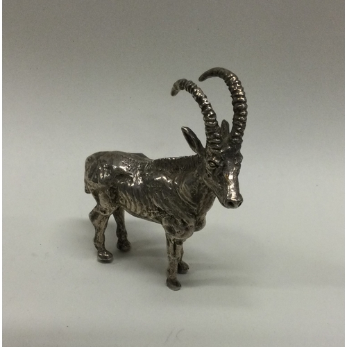 12 - An African silver figure of a deer. marked to base. Approx. 147 grams. Est. £200 - £300.