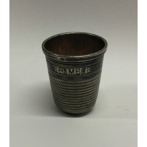 14 - A silver plated thimble cup. Est. £50 - £80.