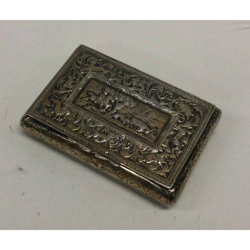 159 - OF EQUESTRIAN INTEREST: A Victorian chased silver snuff box decorated with horses and other animals.... 