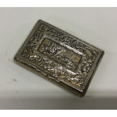 159 - OF EQUESTRIAN INTEREST: A Victorian chased silver snuff box decorated with horses and other animals.... 