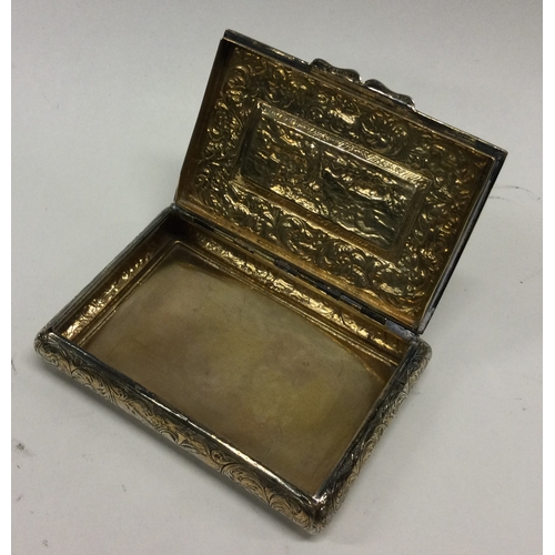 159 - OF EQUESTRIAN INTEREST: A Victorian chased silver snuff box decorated with horses and other animals.... 