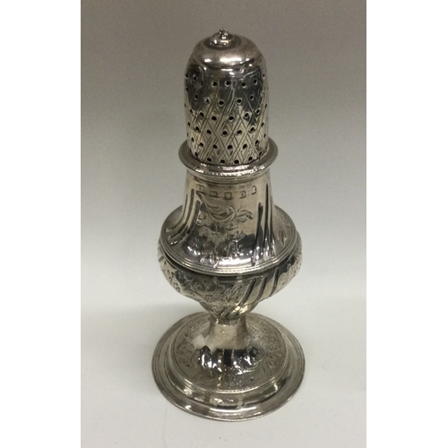 32 - HESTER BATEMAN: An 18th Century George III chased silver sugar caster. London 1789. Approx. 80 grams... 