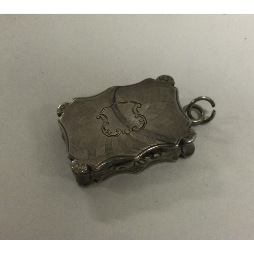 56 - An engine turned silver vinaigrette. Birmingham 1845. By Nathaniel Mills. Approx. 12 grams. Est. £15... 