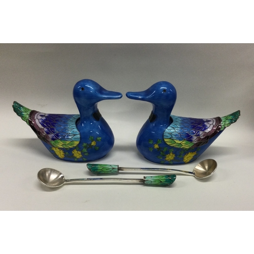 62 - A pair of silver and enamel sauce boats in the form of ducks together with matching spoons forming p... 