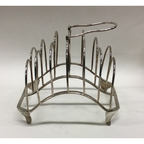 63 - A large George III silver toast rack. London 1803. By John Emes. Approx. 245 grams. Est. £250 - £350... 