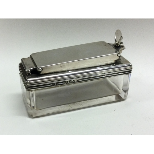 68 - A Victorian silver mounted glass inkwell. London 1846. By Thomas Diller. Est. £150 - £200.