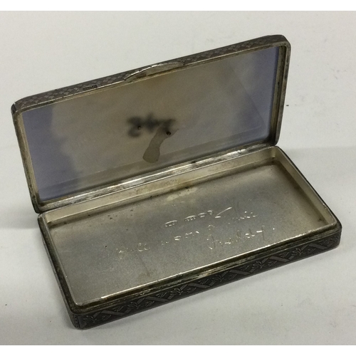 70 - A silver and enamel hinged top box with gold inlay bearing import marks. Approx. 74 grams. Est. £120... 