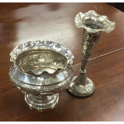 183 - A chased Indian silver bowl together with a silver plated vase. Approx. 102 grams of weighable silve... 