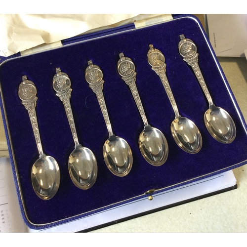 44A - A cased set of six Mappin and Webb silver spoons. Approx. 60 grams. Est. £30 - £40.