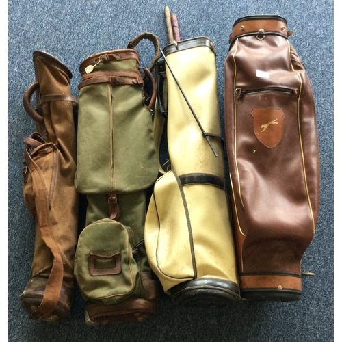 1562 - Four vintage golf bags. Various makers. Est. £20 - £30.