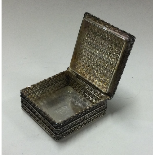 109 - An unusual English silver box with filigree decoration. Approx. 25 grams. Est. £30 - £40.