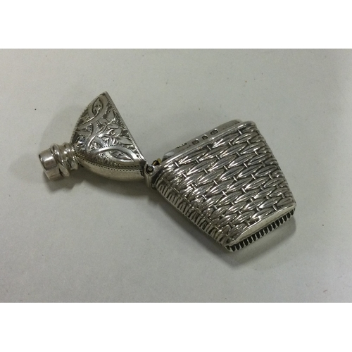 11 - A novelty silver vesta case in the form of a scent bottle. Birmingham 1901. Approx. 15 grams. Est. £... 