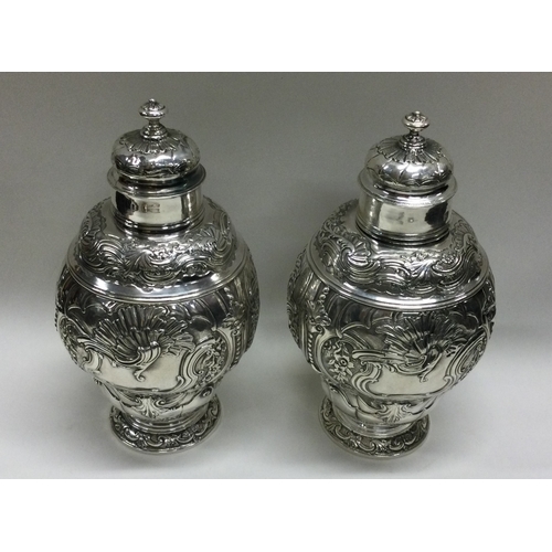 116 - An 18th Century pair of silver tea caddies. London 1759. By Christian Hillan. Approx. 468 grams. Est... 