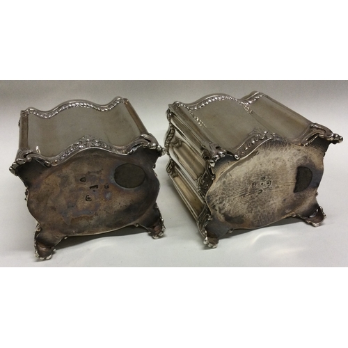 119 - A good pair of 18th Century George III silver tea caddies. London 1780. By Lewis Hamon. Approx. 501 ... 