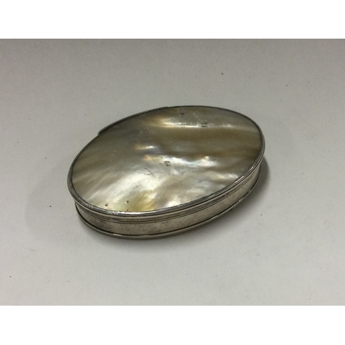 13 - A 19th Century silver and MOP snuff box. Apparently unmarked. Approx. 32 grams. Est. £150 - £200.