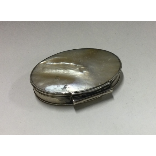 13 - A 19th Century silver and MOP snuff box. Apparently unmarked. Approx. 32 grams. Est. £150 - £200.