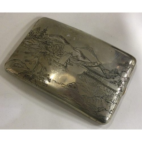 133 - A large Japanese silver cigarette case decorated with rivers. Marked Sterling to interior. Approx. 1... 