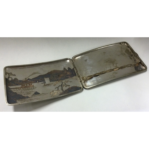 133 - A large Japanese silver cigarette case decorated with rivers. Marked Sterling to interior. Approx. 1... 