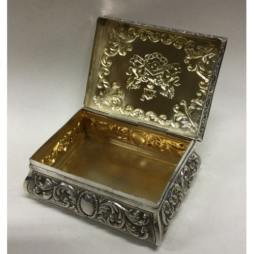 153 - A large novelty Victorian silver chased table snuff box. London 1895. By John Macleod Crouch. Approx... 