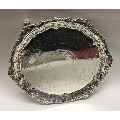 183 - A good Edwardian silver salver with engraved decoration. London. Approx. 388 grams. Est. £100 - £200... 