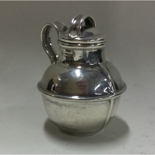 192 - A circular silver pepper in the form of a jersey can. Birmingham. Approx. 30 grams. Est. £25 - £35.