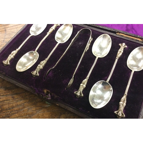 240 - A good set of six cast silver teaspoons together with matching tongs. London. Approx. 90 grams. Est.... 