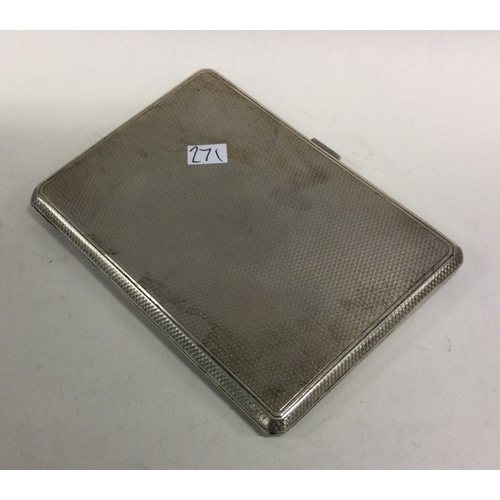 271 - A heavy silver engine turned cigarette case. Approx. 187 grams. Est. £50 - £80.