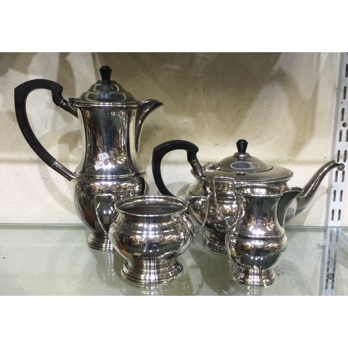 313 - A silver plated four piece tea and coffee service. Est. £20 - £30.