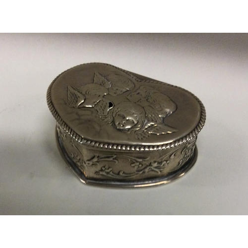 45 - A heart shaped silver dressing table box decorated with winged infants. Approx. 75 grams. Est. £30 -... 