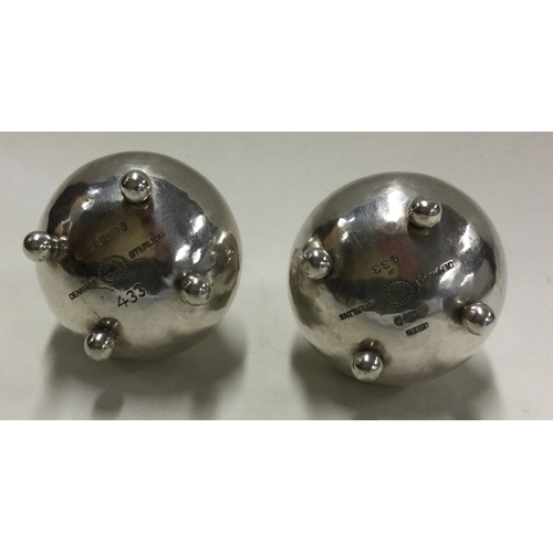 48 - GEORG JENSEN: A good pair of salt and pepper pots. Marked to bases. Approx. 51 grams. Est. £250 - £3... 