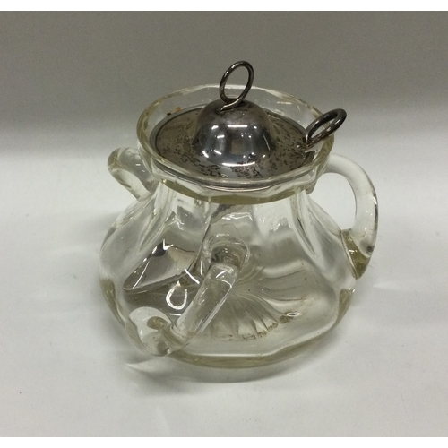 56 - An Arts & Crafts glass preserve jar with silver lid and matching spoon. Birmingham 1911. Est. £30 - ... 