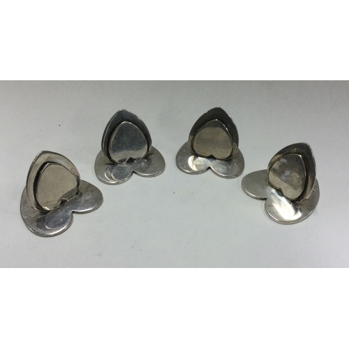 67 - CHESTER: A good set of four silver menu holders in the shape of hearts. 1905. By Sampson Mordan. App... 