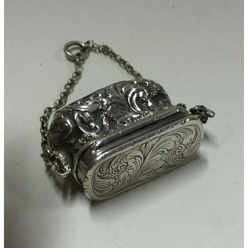 68 - An unusual silver vinaigrette in the form of a handbag. Birmingham 1856. By JT. Approx. 15 grams. Es... 