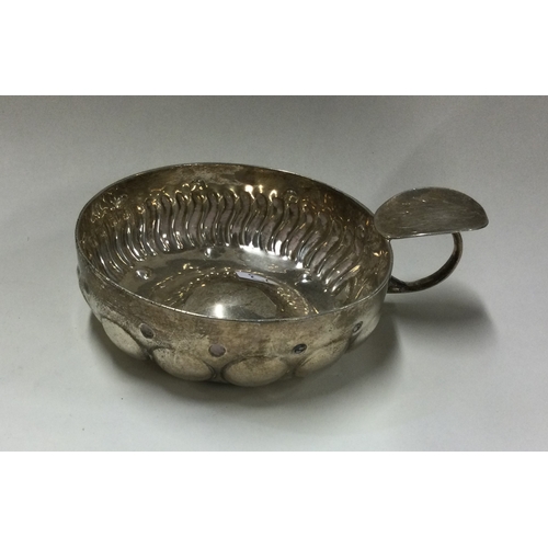 73 - An Antique French silver wine taster. Approx. 92 grams. Est. £80 - £120.