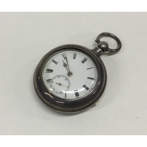 911 - A gent's silver Verge pocket watch with white enamelled dial. Est. £30 - £50.