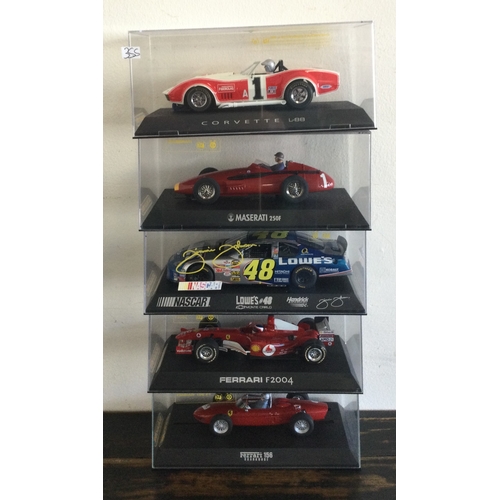 355 - SCALEXTRIC: Five various boxed model racing cars. Est. £20 - £30.